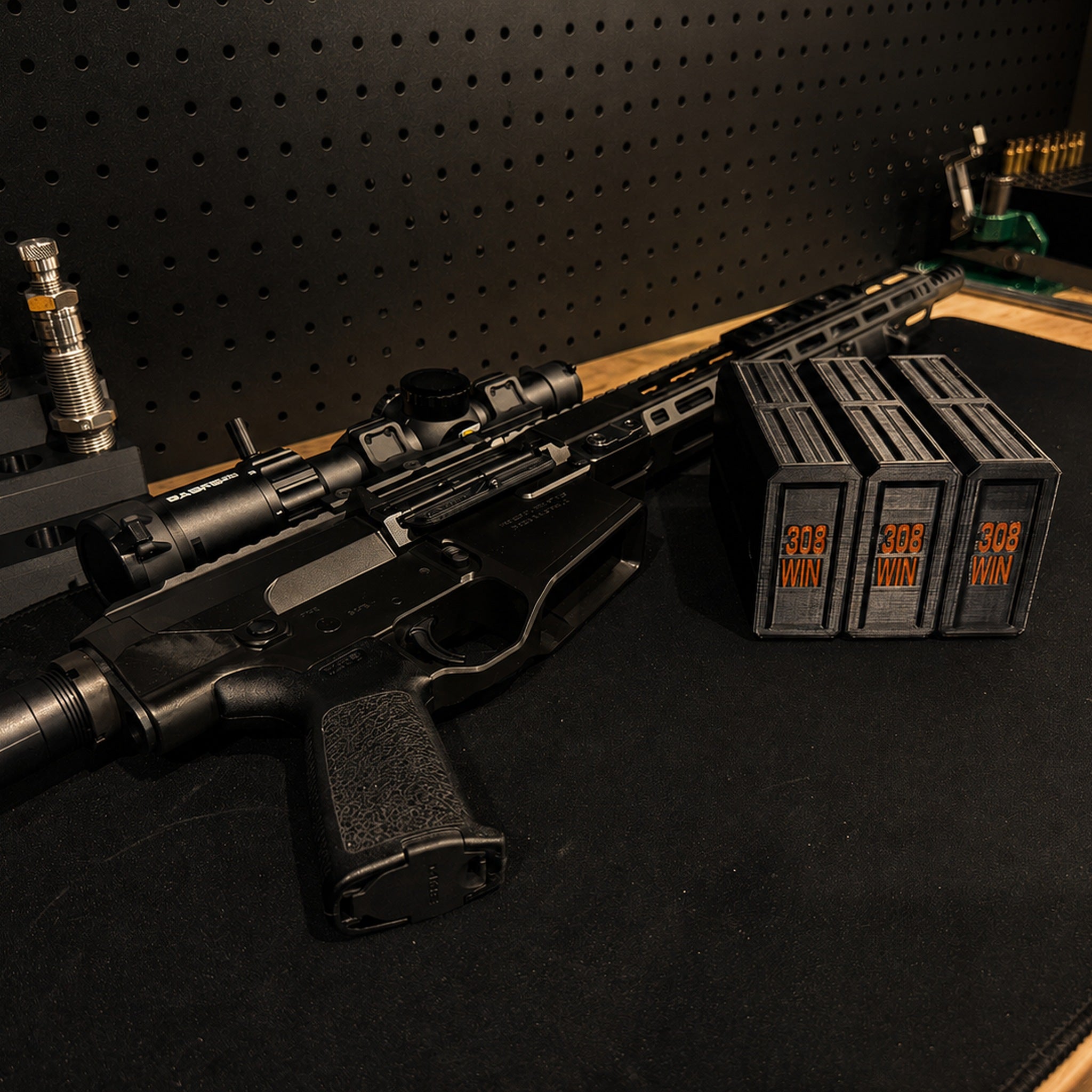 Forward Point Sleeve Cases beside a rifle, alternate angle